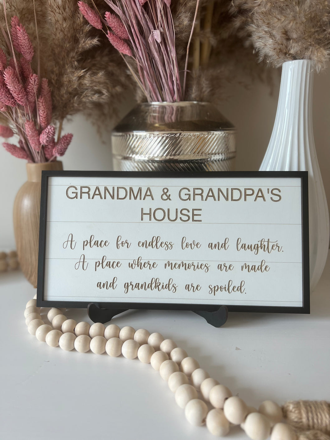 Grandma and grandpa sign