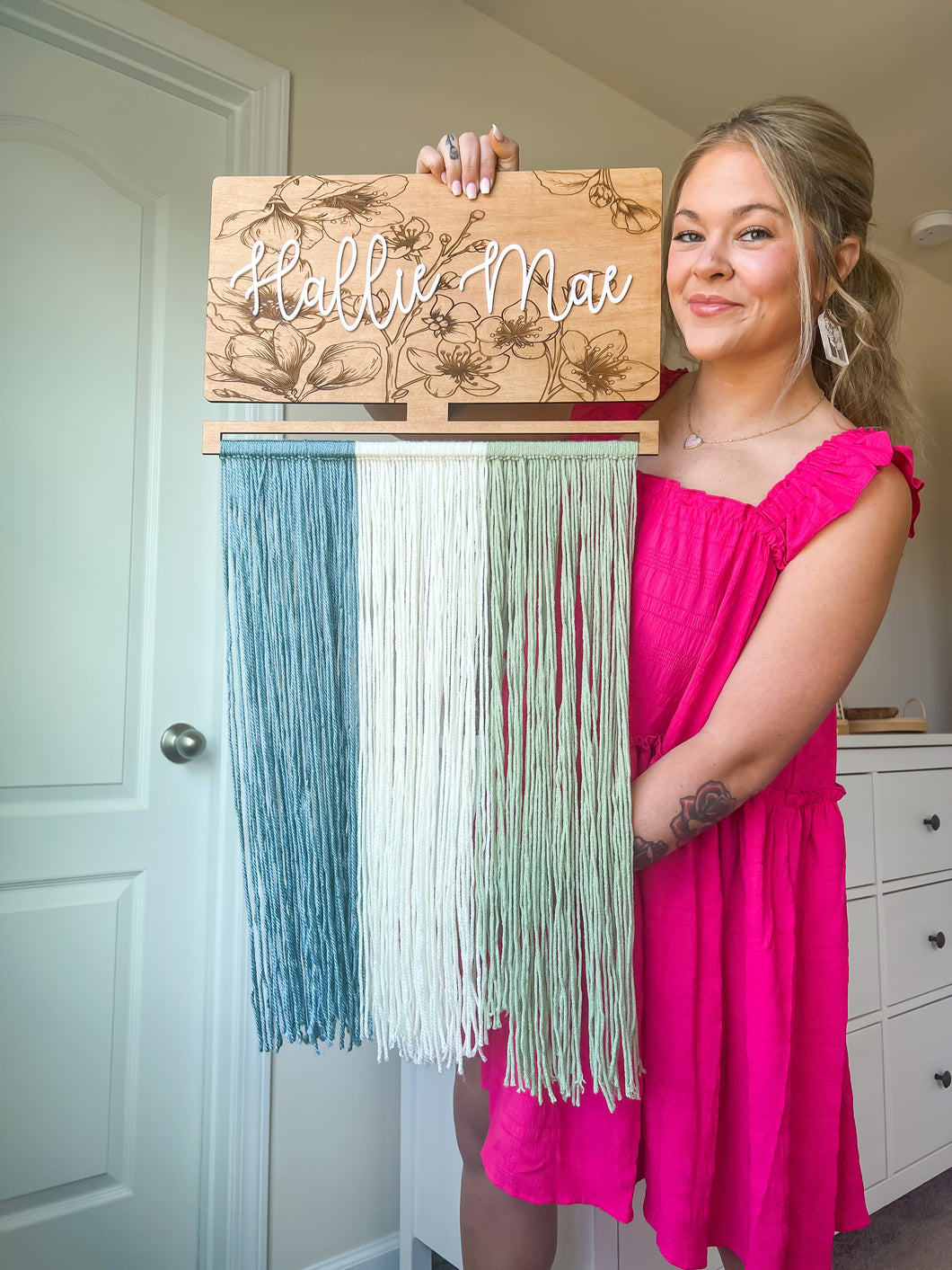 Floral engraved bow holder